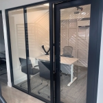 Glass private office front with black aluminum finish #1752