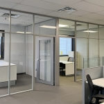 NxtWall Flex Series glass offices with powered solid panel sidewalls #1705