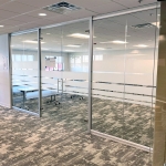 Anodized framed Glass walls with privacy window film financial presentation room #1708